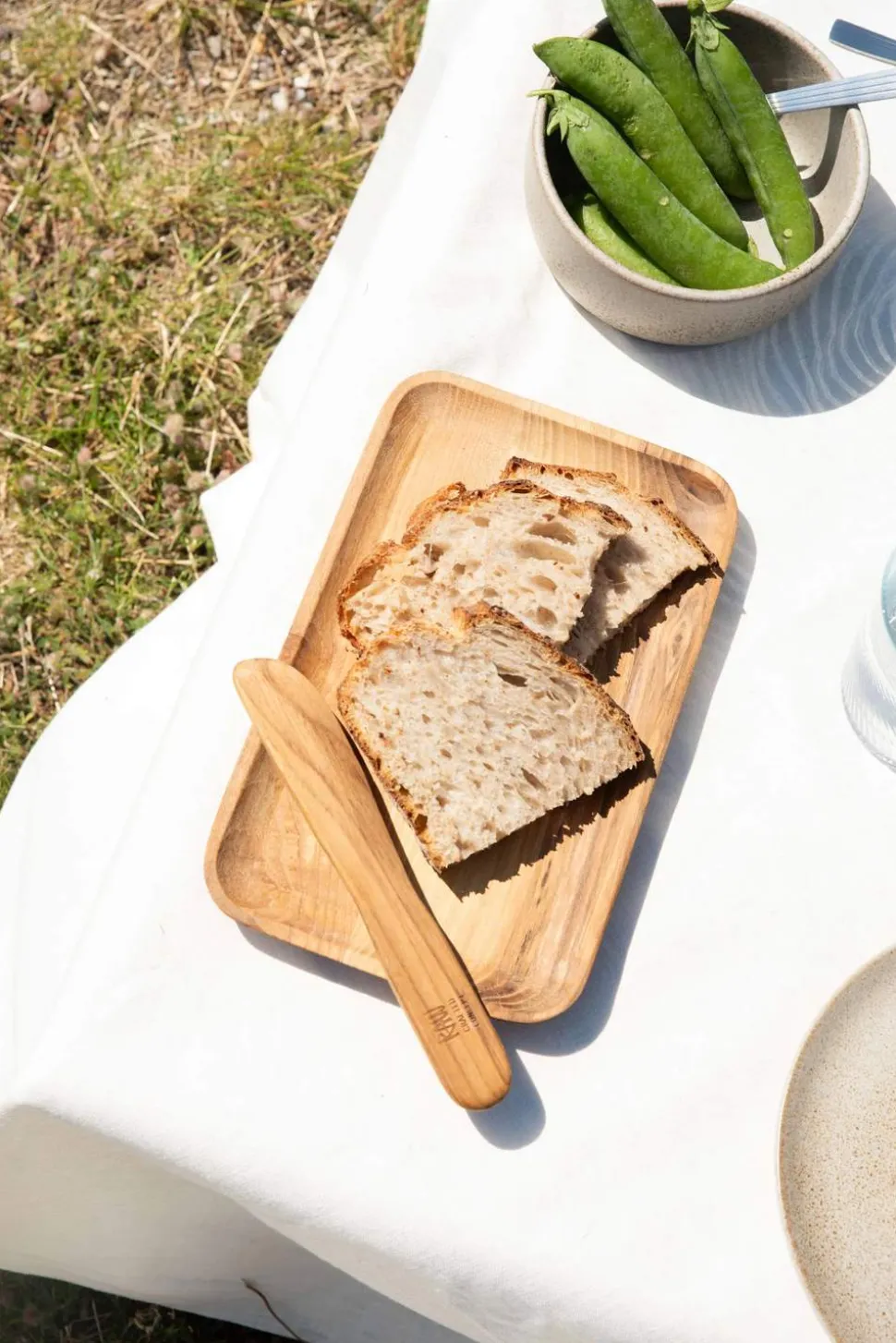 Teaktallerken